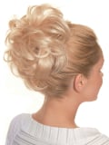 Chouchou New Event : chignon maxi bun 11 cm en fibre synthétique à fixer avec une pince, volume immédiat et look naturel.