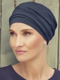 Bonnet turban Nomi Christine Headwear en coton Supima Caretech®, doux et respirant, avec bandeau plissé pour un volume naturel.