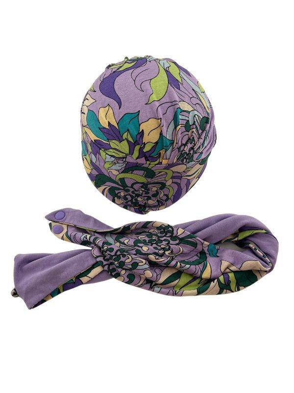 Set Anea Gisela Mayer : bonnet + bandeau à pressions, motifs élégants, viscose douce pour un rendu naturel et confortable.