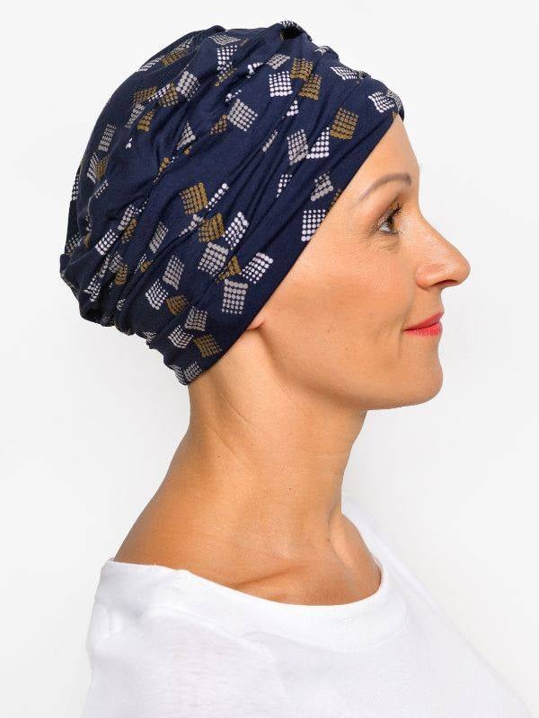 Bonnet chimio Marlene Printed Rosette La Vedette en viscose, sans couture, effet volume, doux pour cuir chevelu sensible