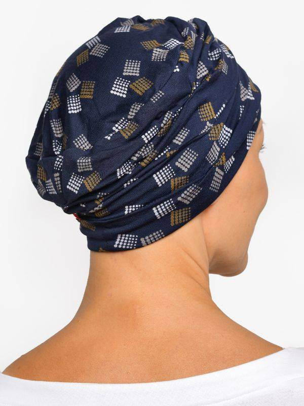 Bonnet chimio Marlene Printed Rosette La Vedette en viscose, sans couture, effet volume, doux pour cuir chevelu sensible