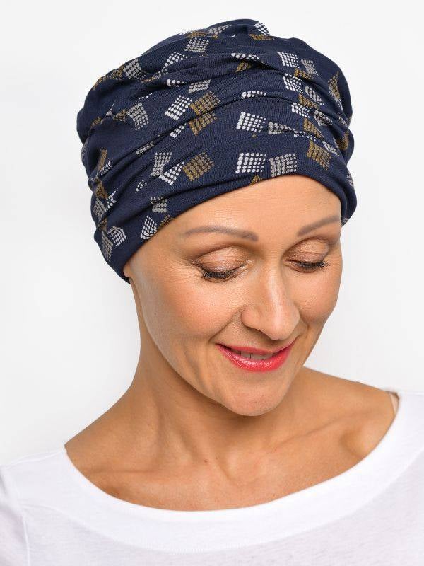Bonnet chimio Marlene Printed Rosette La Vedette en viscose, sans couture, effet volume, doux pour cuir chevelu sensible