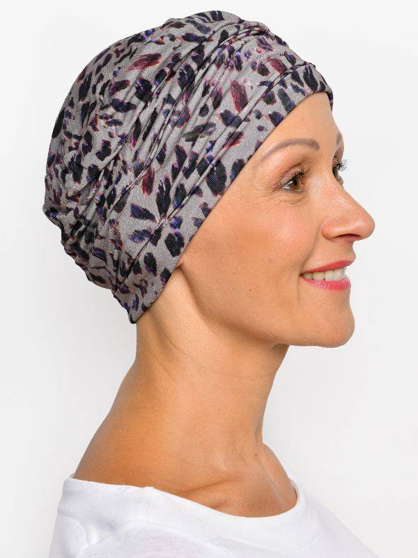 Bonnet chimio Marlene Printed Rosette La Vedette en viscose, sans couture, effet volume, doux pour cuir chevelu sensible