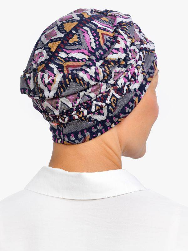 Bonnet chimio Marlene Printed Rosette La Vedette en viscose, sans couture, effet volume, doux pour cuir chevelu sensible
