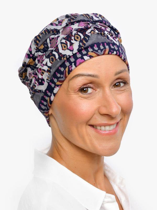 Bonnet chimio Marlene Printed Rosette La Vedette en viscose, sans couture, effet volume, doux pour cuir chevelu sensible