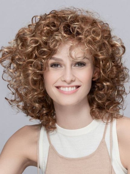 Perruque Jamila Plus — boucles resserrées mi-longues pour un volume élégant