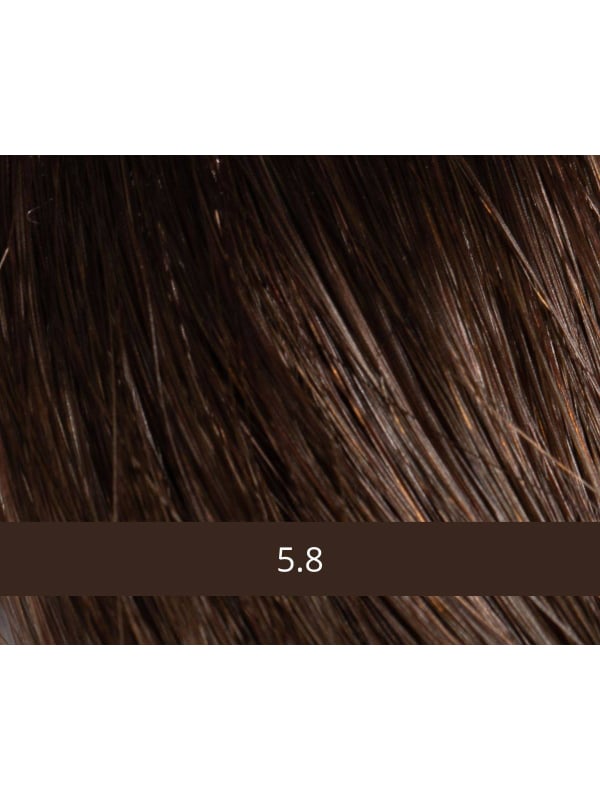 Perruque Christelle NJ Création : longue lisse, frange côté, tulle discret et maintien antiglisse pour un rendu naturel.