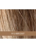 Perruque médicale Iris NJ Création : cheveux longs lisses, frange rideau, tulle frontal discret et technologie antiglisse.