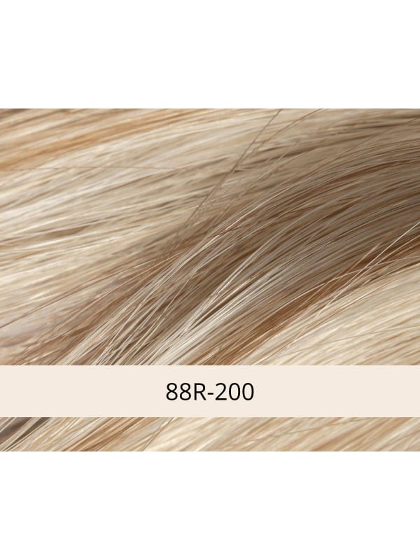 Perruque Jasmin NJ Création : coupe Bob courte lisse avec frange, tulle cinéma discret et technologie antiglisse confortable.