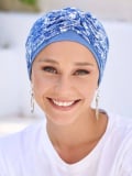Turban Opéra NJ Création : turban léger avec grand nœud modulable pour un volume élégant, à porter sur le côté ou sur le dessus.