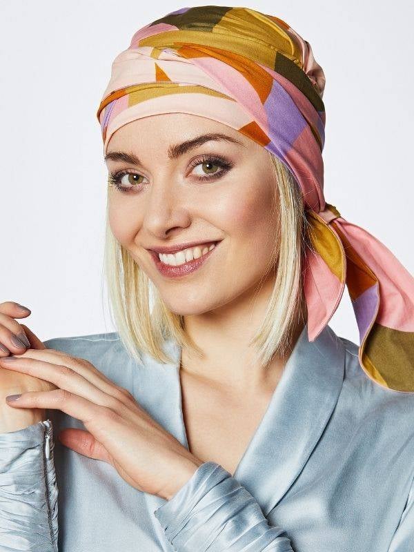 Turban Nola Long Gisela Mayer : pans mi-longs, viscose douce, motifs colorés, idéal en cas de chimiothérapie, alopécie ou pelade