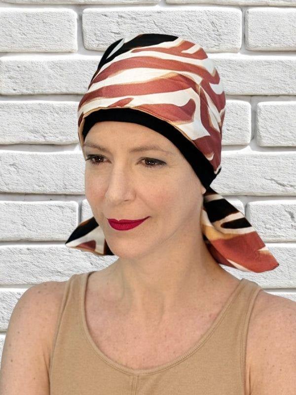 Bandeau Aline MM Paris en acrylique, motifs vifs : à nouer sur turban pour varier styles et volumes.