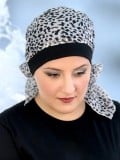 Foulard Ughet MM Paris : turban en coton déjà noué, motif fleuri, confortable et léger, idéal pendant la chimiothérapie.