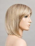 Perruque Change : carré mi-long effilé avec frange droite, fibre synthétique, look catwalk naturel et facile à coiffer.