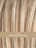 Perruque Aurora Comfort : coupe dégradée ondulée, effet rooted/mix, 100% fait main pour un confort léger et un rendu élégant.