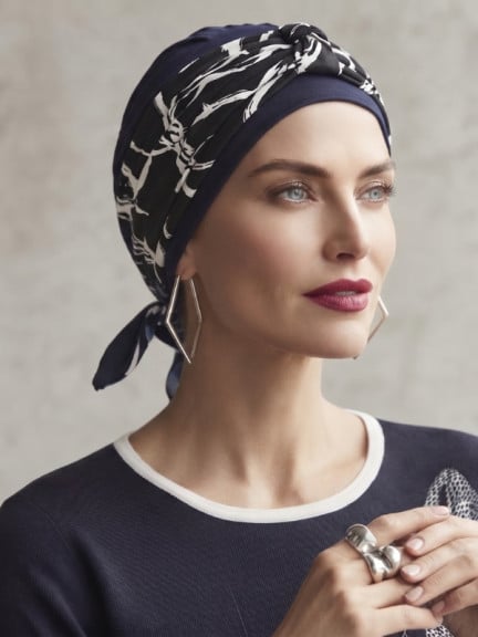Bandeau Jolie Gisela Mayer à nouer, imprimé et doux, pour personnaliser bonnet ou turban avec confort au quotidien. Choisissez v