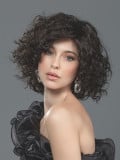 Perruque Loop Ellen Wille mi-longue bouclée en fibre synthétique avec lace front, volume naturel et bonnet standard. Comparez le